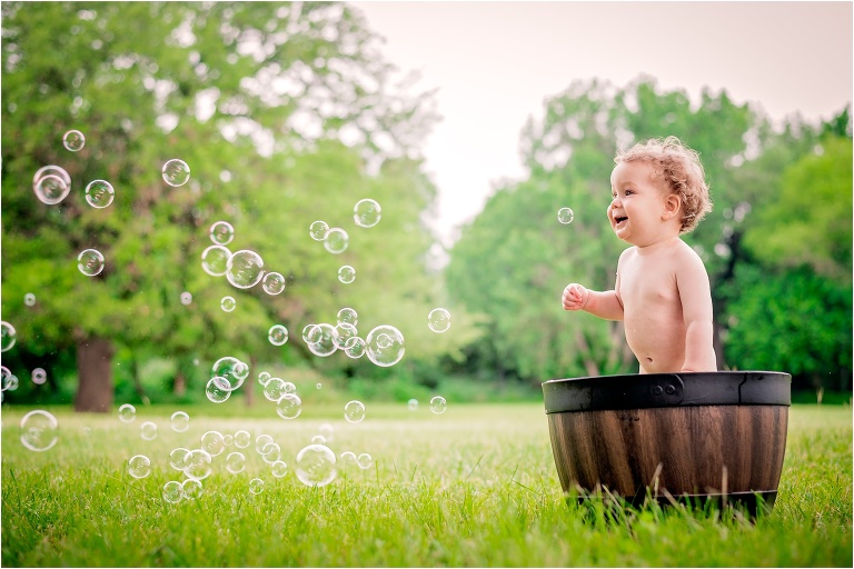 Toddler in tub with bubbles Round Rock Texas Photographer