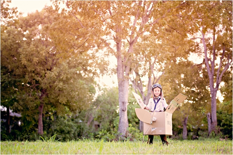 Boy in cardboard airplane Child Creative Photoshoot