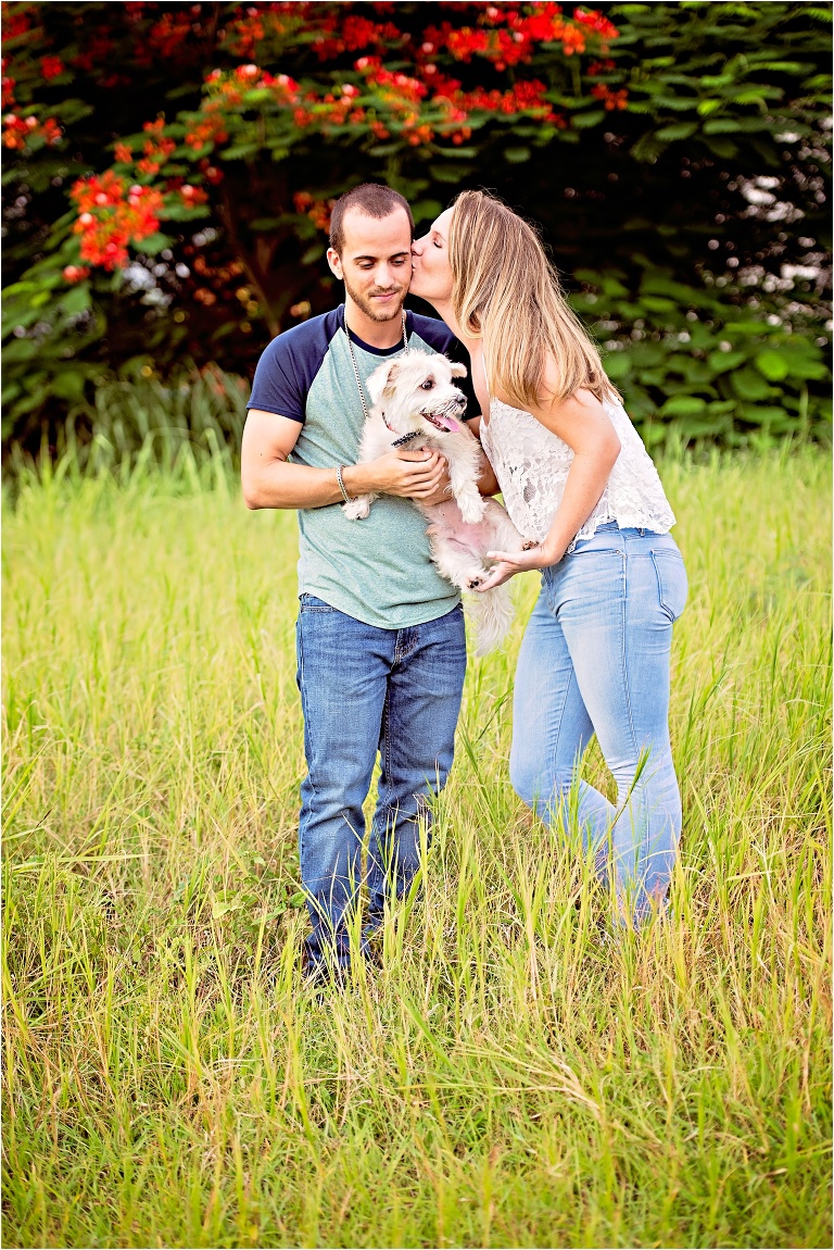 Couple and their Morkie in Field Grand Cayman