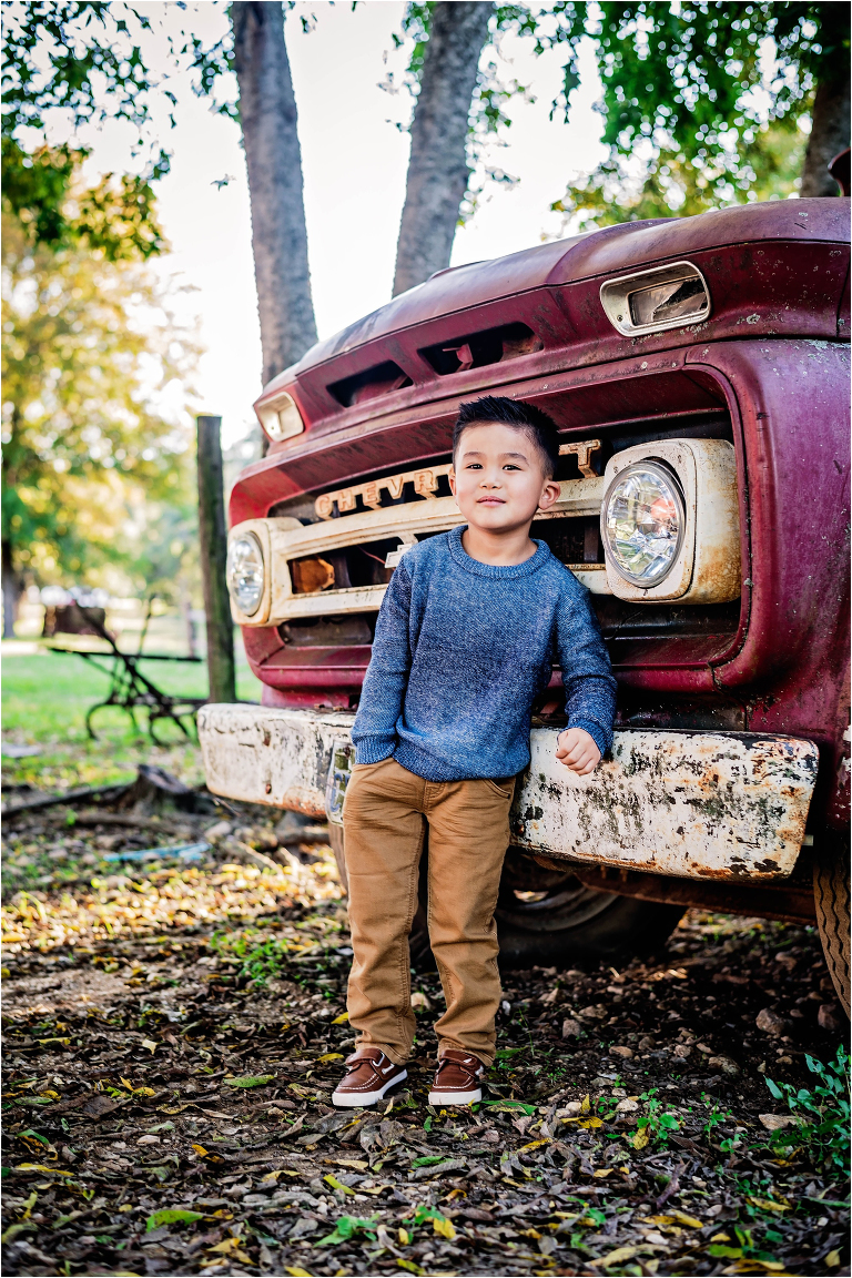 Child Photographer Boy beside Chevy Truck Round Rock Texas