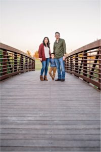 Family on Bridge Christmas Photos in Round Rock Texas Natural Light Photographer