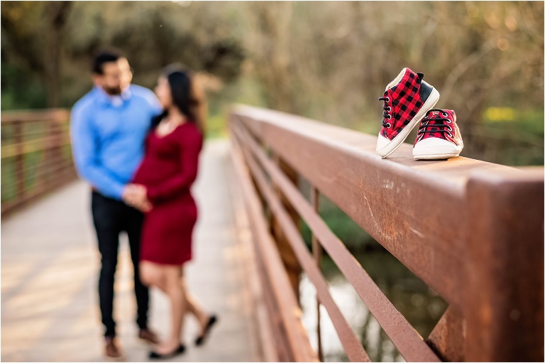 Sunset Session Natural Light Maternity Photoshoot on Bridge with Baby Shoes