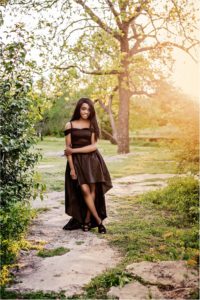 Girl in Black Dress for Senior Portrait Photoshoot in Round Rock Texas by Natural Light Photographer