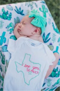 Keep Austin Weird I love you so much Newborn Baby Girl in Austin Texas Summer Photoshoot in wooden crate wearing turquoise bow Natural Light Photoshoot