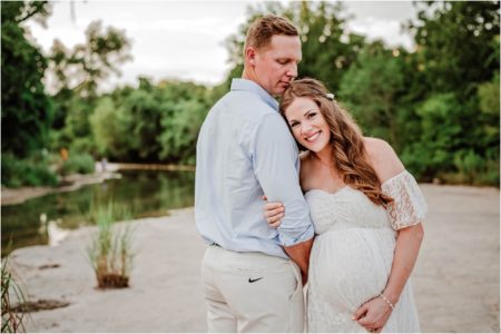 Couple Cuddling in Austin Texas Park during Golden Hour Maternity Photoshoot Natural Light Photography