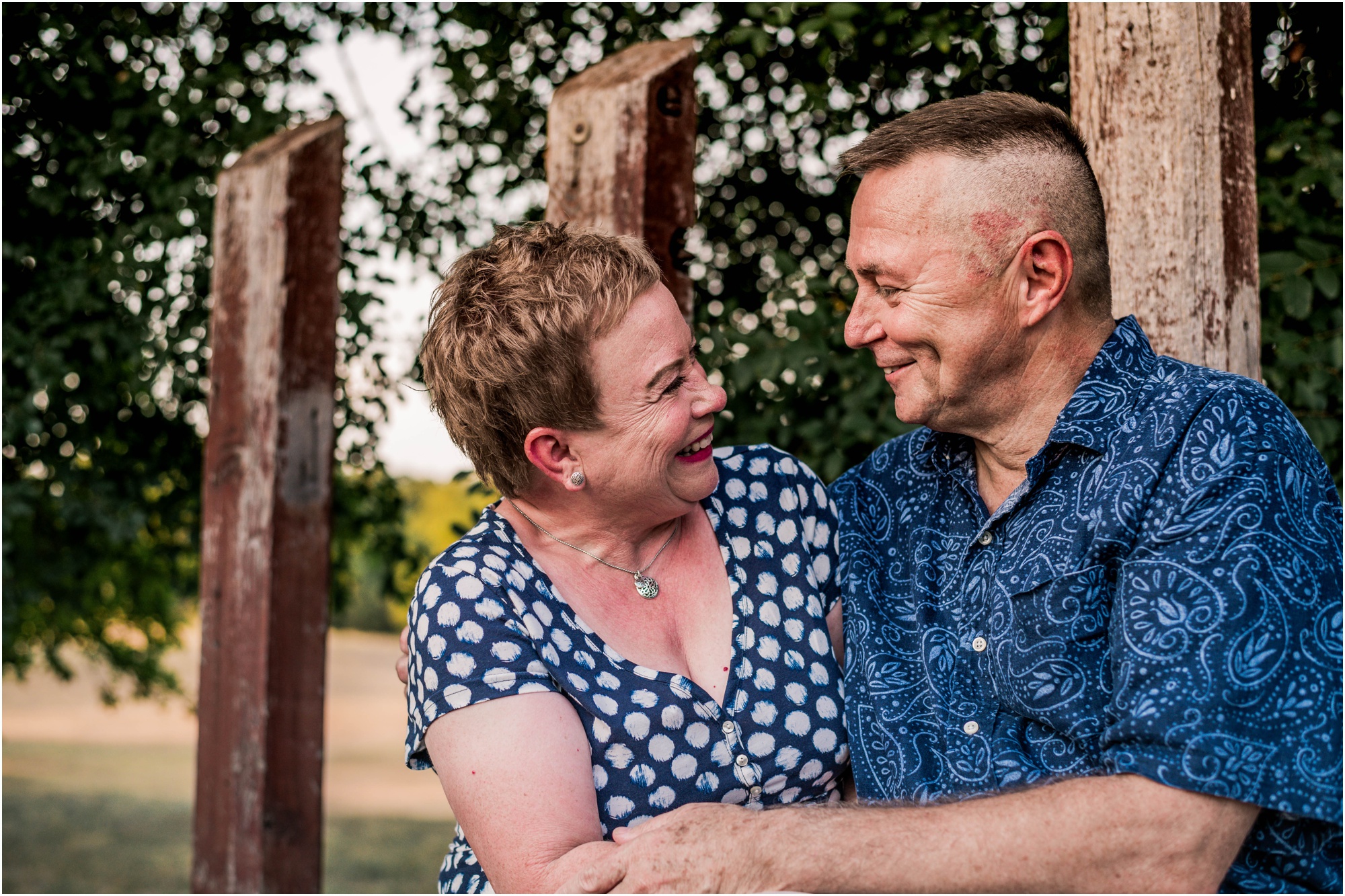 Sweet couple cuddling in Austin Texas by Natural Light Family Photographer