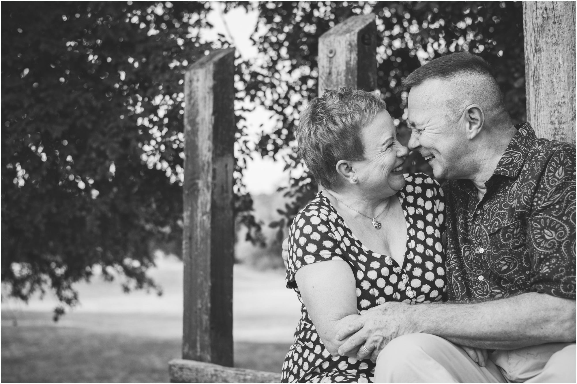 Sweet couple cuddling in Austin Texas by Natural Light Family Photographer