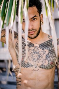 Handsome Male Model on beach in Grand Cayman Islands by Natural Light Portrait Photographer based in Austin TX