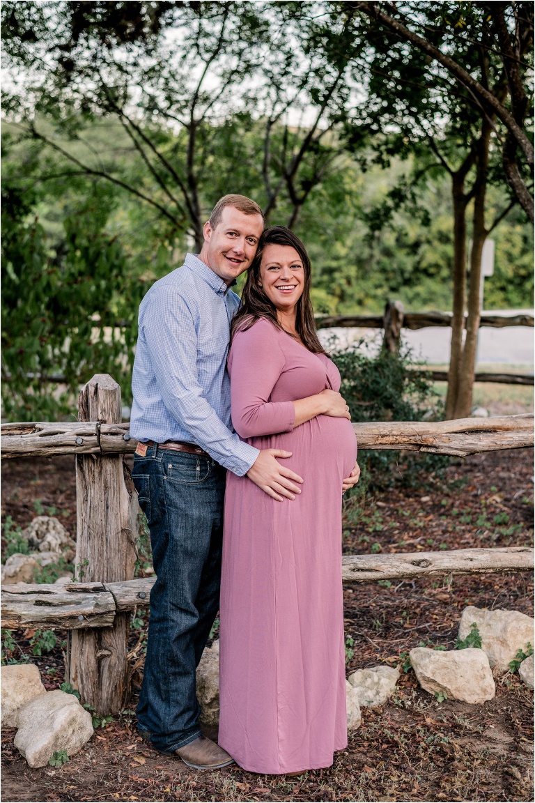 Maternity Photoshoot with expecting mother in pink maxi dress austin texas natural light photographer