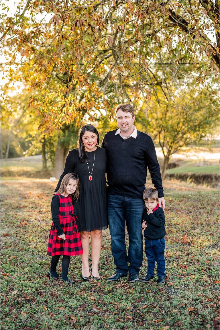 Family of four in Pflugerville Texas for Christmas portraits by natural light photographer