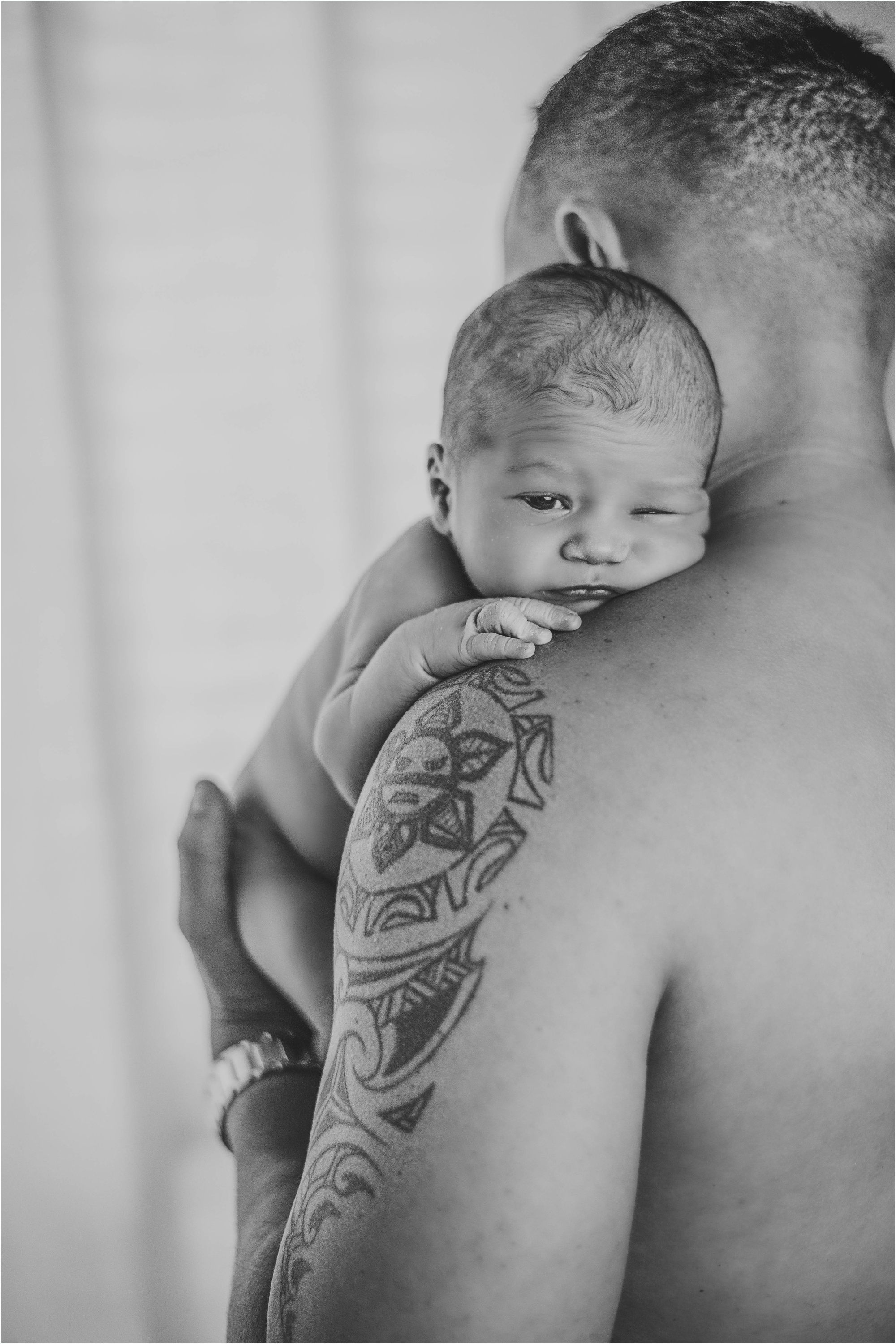 indoor newborn photoshoot with baby boy on dad austin texas baby photographer