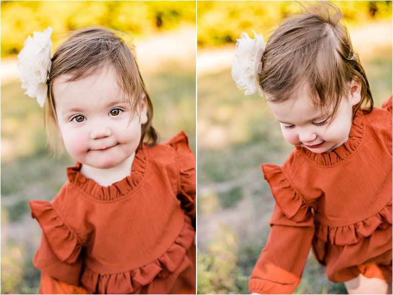 Beautiful little girl toddler in orange onesie Georgetown Texas Children portrait photographer