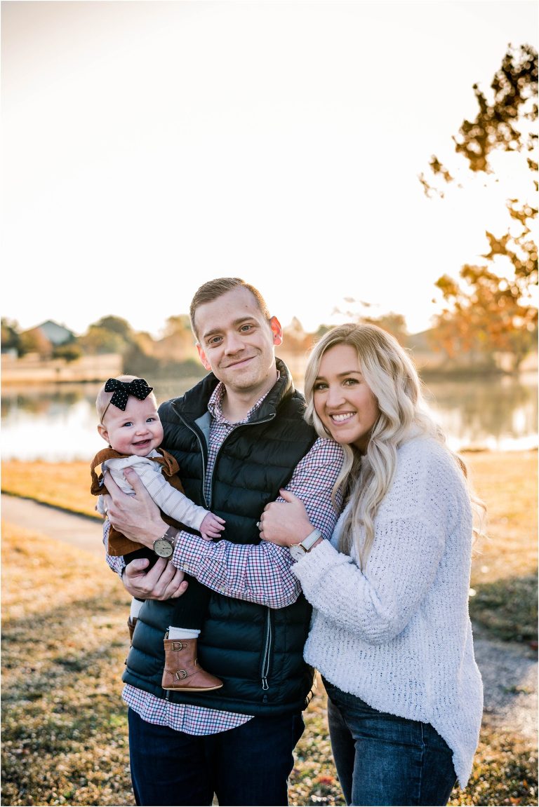 Family of three during morning Christmas photoshoot in Round Rock Texas by natural light portrait photographer