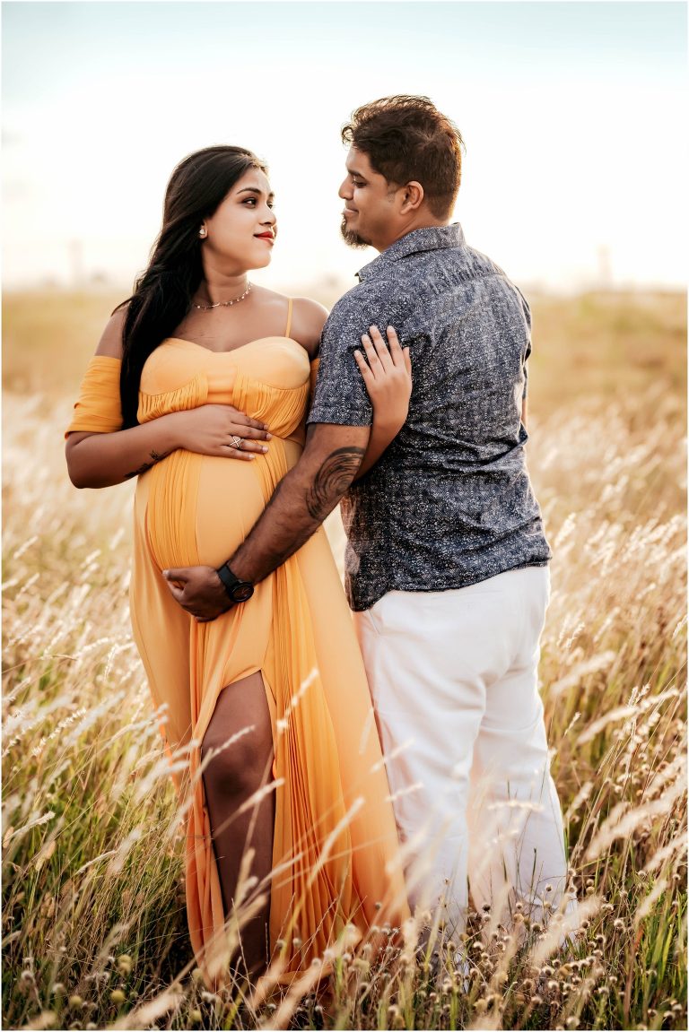 Couple during maternity photoshoot in Round Rock Texas by natural light portrait photographer