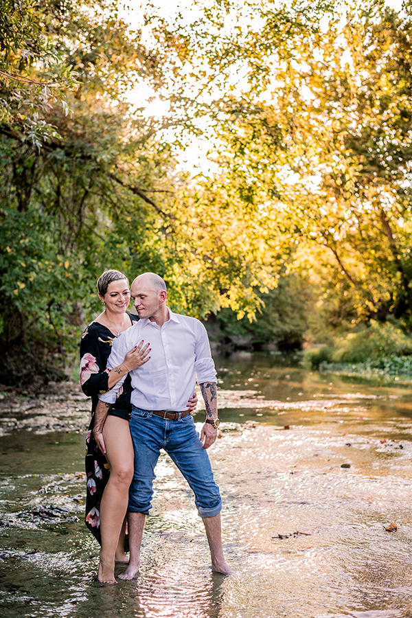 Couple standing in water natural light photoshoot in Georgetown Texas by natural light photographer